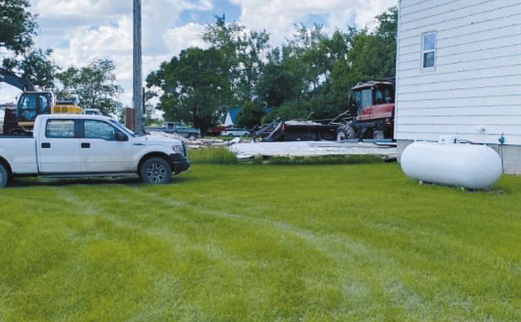 The Edmore Curling Club is demolished after a recent storm left part of the building collapsed. While the loss of the longtime gathering place is bittersweet for many residents, cleanup efforts continue ahead of Edmore's 125th anniversary celebration July 24-25. Photo courtesy of Amanda Sten