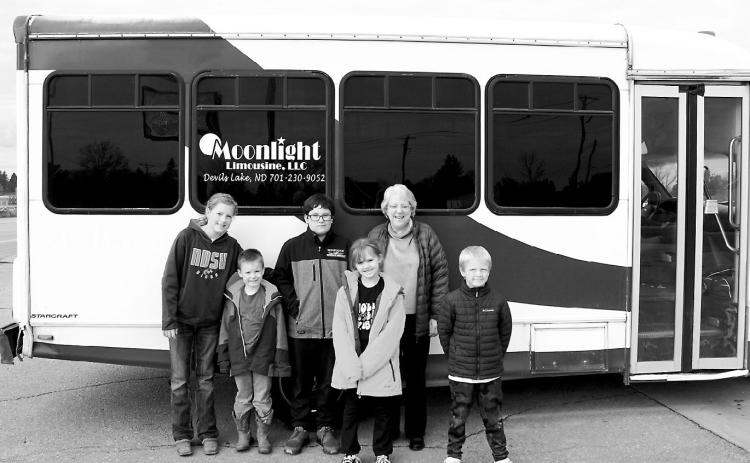 Munich School hosted “Fall into Reading” in which teams of five competed to see how many hours they could read in the month of October. Photographed (L-R) Audrey Martin, Harrison Leverne, Aven Goeser, Amanda Hall, and Mason Price won the competition with a combined 700 hours of reading for the month! They were awarded with a trip on a party bus to Dairy Queen for lunch. Photo by Larry Stokke.