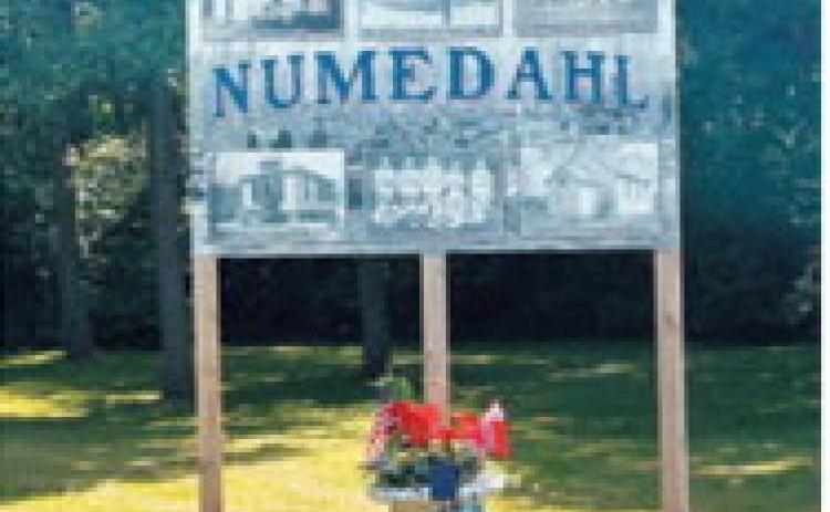 A new community sign shares photographs and history from Numedahl, which was first settled in 1888 by homesteaders from Numedal, Norway. P hoto submitted by Cory Lien