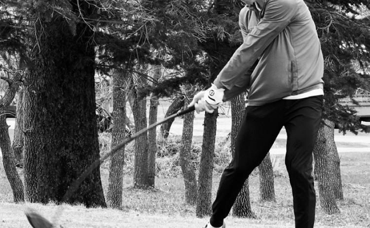 North Border's Kaden Moore tees off in McVille April 1 and finished the day in 7th place with a score of 82. Photo by Larry Stokke.