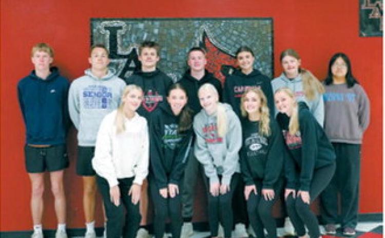 Cardinal Track and Field State qualifiers: Back row from left: Caleb McDonald, Tanner McDonald, TJ Henderson, Levi Swanson, Taya Feist, Fenja Lawson, Christine Joyner. Front row from left: Meggy Hetletved, Olivia Lorenz, Mya Swanson, Ella Goodman, Hallie Overby. Photo by Larry Stokke