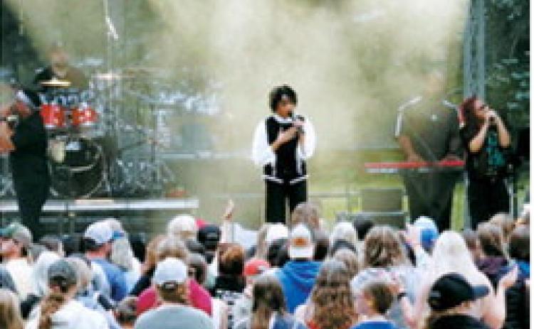 Performers take the stage during the Off the Charts music festival, entertaining the crowd with an evening of live music. Photo by Larry Stokke