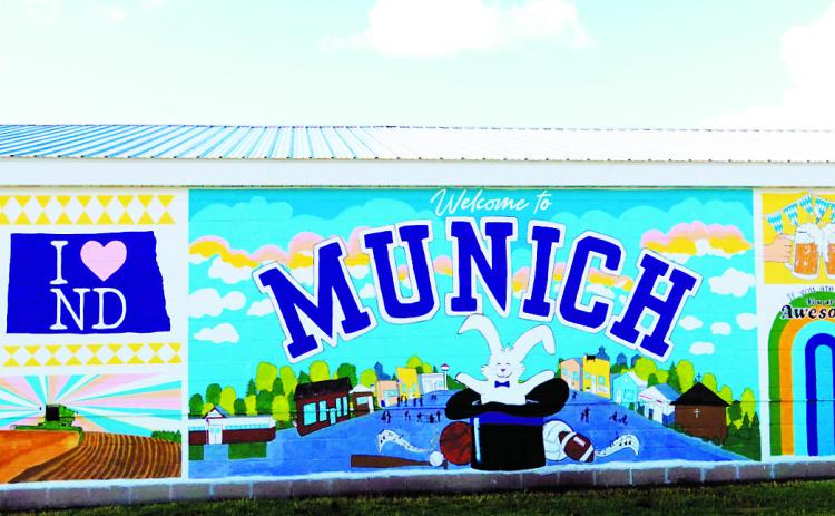 Munich's new downtown mural celebrates the community's history, heritage and agricultural roots through colorful images representing agriculture, local traditions, recreation and small-town life. Photo by Larry Stokke