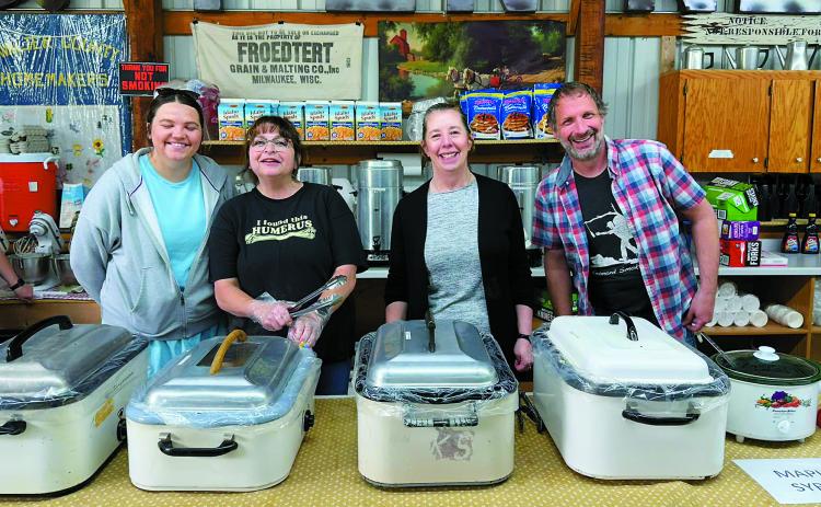 Volunteers Josie, Kari, Barb, and Terry working the line at the Father’s Day Breakfast in Dresden. Photo by Shauna Schneider.