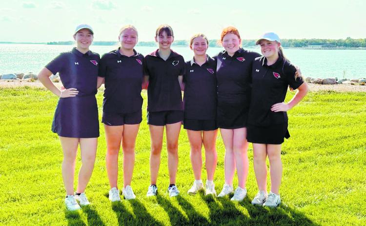 The Cardinals golf team (L-R) Nadia Lewis, Colby Forest, Lily Zimmer, Harper Jacobson, Stella Busse, and Finley Crockett at the Regional Golf Meet in Devils Lake on Sept. 16.