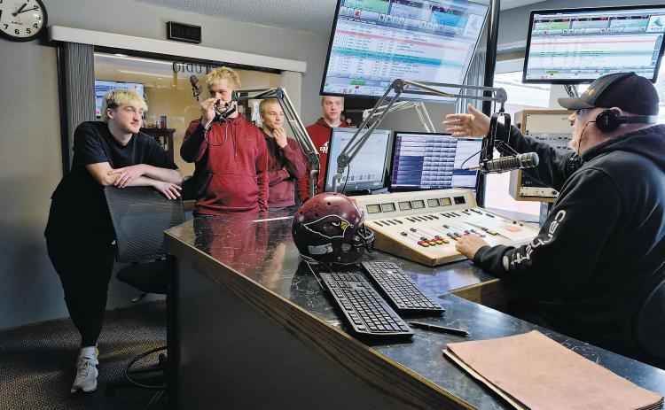 From (L-R) Keaton Ullyott, Theo Romfo, Sam Davis, and Jax Johnson headed over to The Borderland News Center to surprise Jake Kulland on Dec. 2 with a helmet signed by all of the players of the 2025 Langdon-Munich Football team to thank Jake Kulland for all of the hard work and dedication he puts into local athletics. Way to go and thank you Jake!