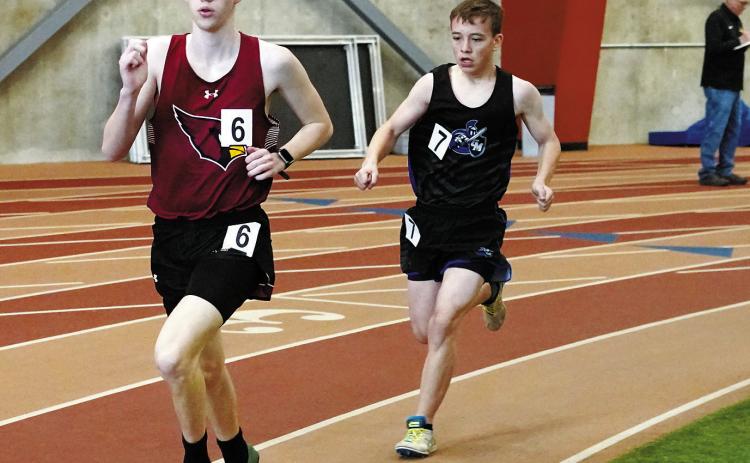 Noah Foster took 1st in the 3000 meter run at the PCN Invitational Meet in Grand Forks. Photo by Larry Stokke.