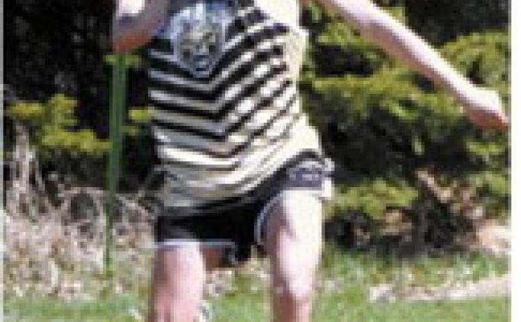 Boone Carrier throws the javelin during the meet in Larimore on May 9. Carrier placed 11th out of 24 competitors with a throw of 93 feet, 4 inches. Photo by Larry Stokke.