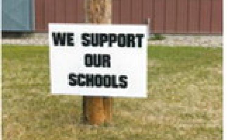 “We support our schools” signs meant to show support