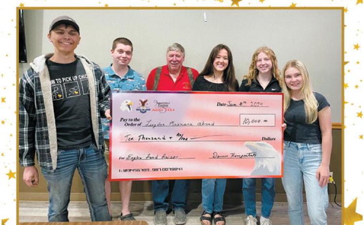 The Langdon Eagles Club has donated $10,000 to the Langdon Area High School students who will be traveling abroad in Europe this summer to study and perform music. Photographed from left to right are Adam Hart, Lane Lindseth and Dean Erickson representing the Eagles Club, Shawna Gette, Claire Chaput, and Caitlyn Goodman.