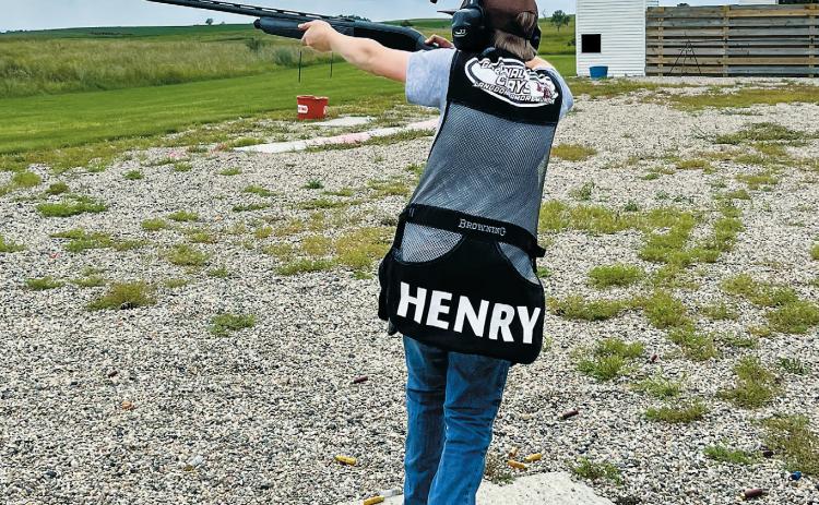 Carl Henry shooting skeet at 4-H State Tournament.
