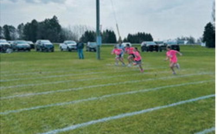 Young runners sprint from the starting line during one of the races at North Border School's Track and Field Day. Students spent the day competing in a variety of events while celebrating the final days of the school year. Submitted photo