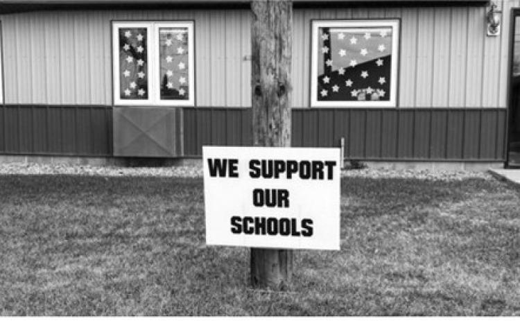 “We Support Our Schools” signs available across community
