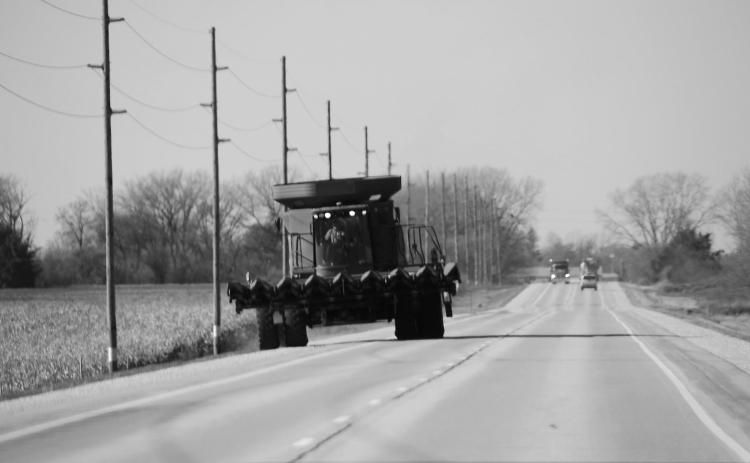 As agricultural producers prepare for harvest season, it is crucial for motorists and farm equipment operators to share the road to prevent roadway collisions. (Photo by Central States Center for Agricultural Safety and Health (CS-CASH))