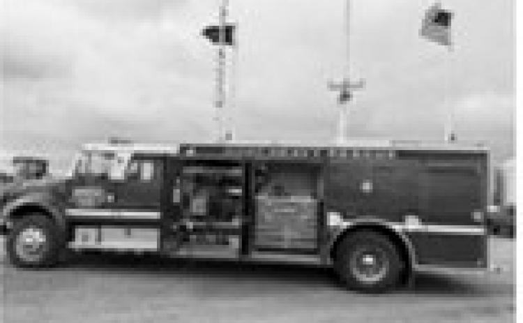 Picture with flags: The 1995 International Beach Rescue Truck, ready to roll.