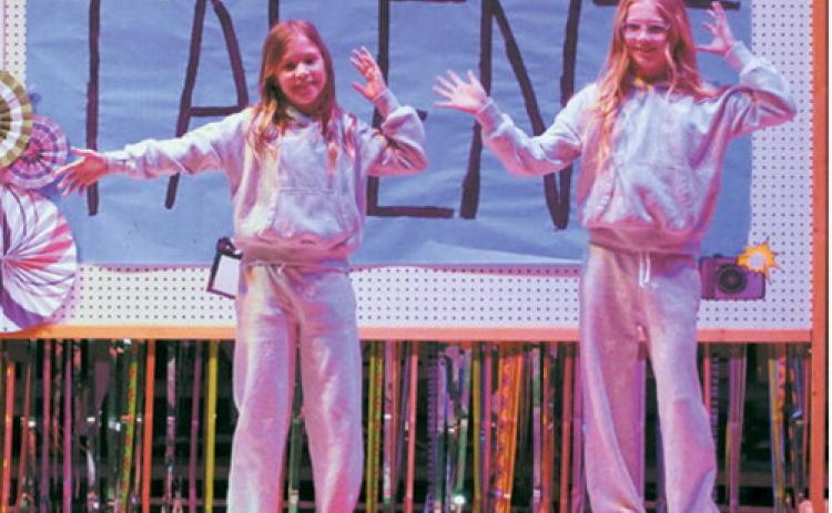 Students perform a choreographed dance number during the annual elementary talent show. The event showcased a variety of performances ranging from music and dance to comedy and other special talents. Photo by Larry Stokke