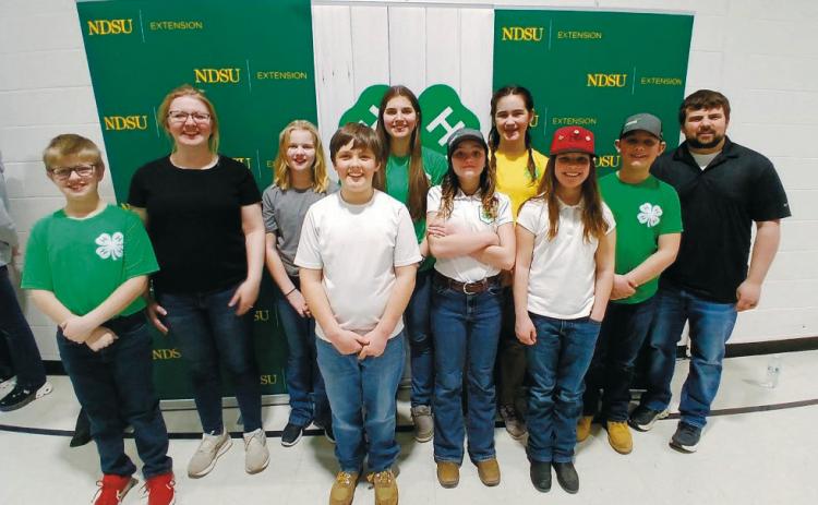 Pembina County Agronomy Team: Front row (L-R) Levi Norrell, Oscar Hunter, Olive Moore, Chloe Hunter; back row, Coach Shana Norrell, Stella Norrell, Anja Schluchter, Naomi Stegman, Rylan Moore and Coach Brandon Breckheimer.