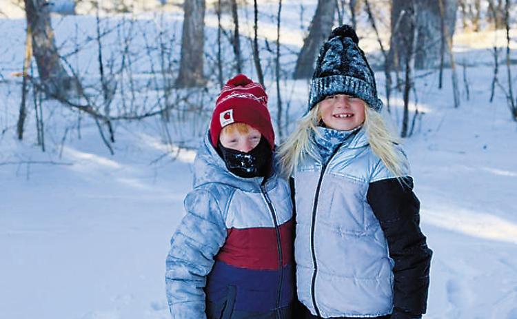 Nettie and Teddy Geddes enjoying the snow. Photo courtesy of Morgan Geddes.