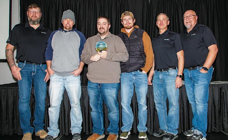 From left to right: Brian Lakoduk, NDAREC; Derek Belle, CREC Lineman; Marty Tetrault, CREC General Manager; Andrew Nyhaugen, CREC Lineman; Mike Koenig, NDAREC; and Jeff Tweten, NDAREC.