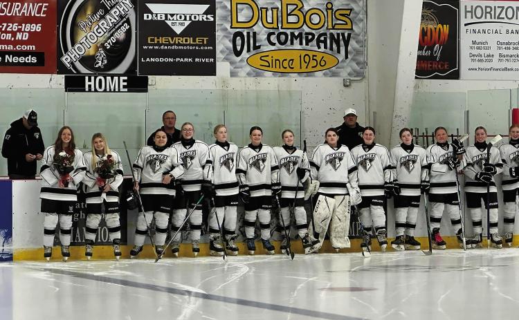 The 19U girls get ready to hit the ice on Senior Night versus Crosby, Jan. 10. Photo by Courtney Krom.