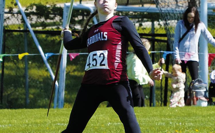 Meredith Romfo took first place at the State Meet in the javelin. She also set a new school record with a throw of 136 feet 5 inches. Photo by Larry Stokke.