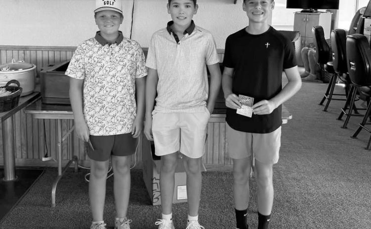 Camden Carpenter, left, placed first in the 12U division of the 2026 Junior Golf Tournament, followed by Mason Bachman in second and Nixon Tryan in third. Submitted photo