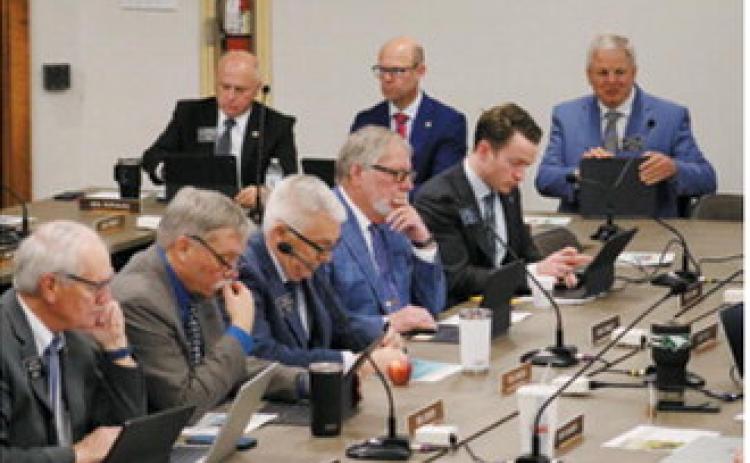 Lawmakers on the Joint Appropriations Committee study legislation during a January special session convened to budget the first two years of the state's Rural Health Transformation Program funding. Photo by Mary Steurer/North Dakota Monitor