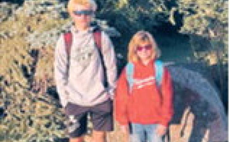 Gunnar, an eighth-grader at Langdon Area Middle School, and Elizabeth, a fifth-grader at St. Alphonsus School, are ready for the new school year. Photo courtesy of Donna Simpson