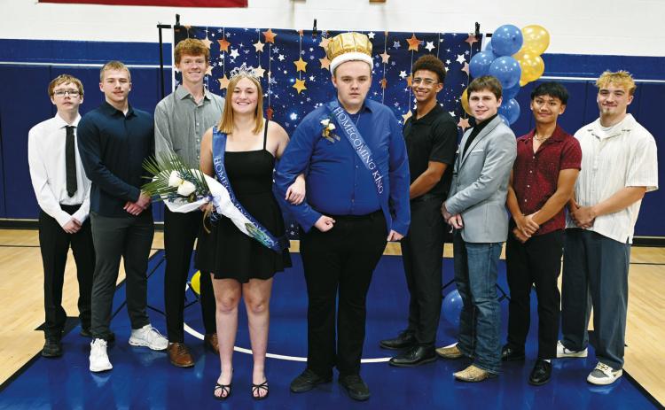 Pembina Homecoming Court (L-R) Hayden Diemert, Jesse Eisenbeis, Bjorn Evenson, Queen Sadie Snyder, King Damien Powell, Trevor Moore, Noah Olson, Lance Santiago, and Kade Schafer. Photo by Ashley Schafer.