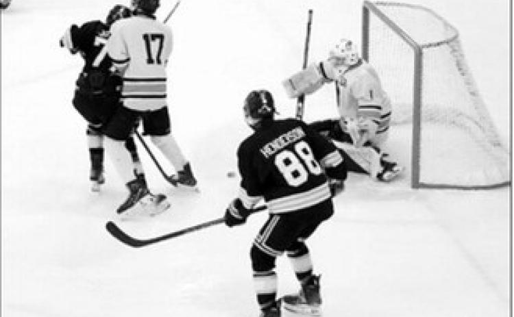 Jax Johnson got the assist setting up Max Henderson with the first of goal of the game with the Grand Forks Stallions. Photo by Larry Stokke