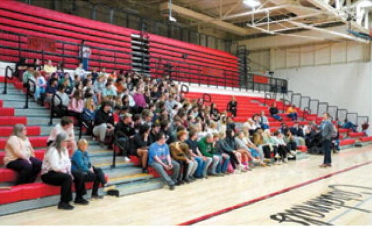 North Dakota State Superintendent Levi Bachmeier speaks in front of students. Photo by Larry Stoke