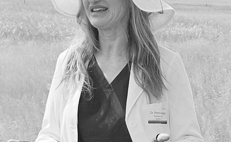 Rebecca Phillips of Ecological Insights, shown in July 2024 in Burleigh County, conducts agriculture research in North Dakota but is awaiting federal payments on some of her work. (Jeff Beach/North Dakota Monitor)