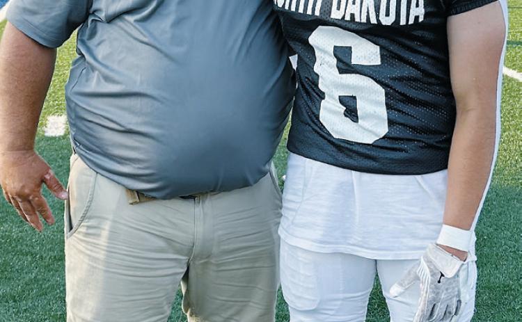 North Border head coach Tim Hartje and Eagles player Grant Cosley were both invited to the 51st North Dakota Shrine Bowl held in Mayville on June 21.