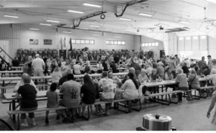 Community members fill the Langdon Fire Hall during the Langdon Fire Department's 43rd annual Fireman's Social and Fundraiser on July 17. The annual event featured a roast beef and pork supper and serves as one of the department's largest fundraisers of the year. Photo by Larry Stokke