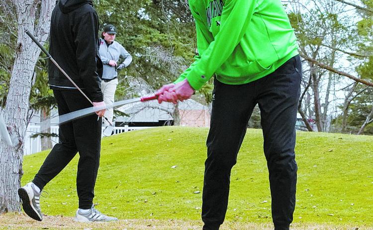 Reese Hoffarth tees off in the Nelson County meet on April 22 in McVille. Photo by Larry Stokke.