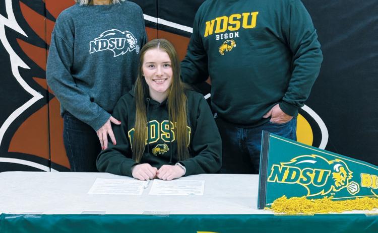 Congratulations to Langdon senior Meredith Romfo, who signed a letter of intent last week for the North Dakota State track and field team. Romfo, who won the State Class B Title in the javelin as a junior this past spring, will be focusing on that event at NDSU. She is the daughter of Troy and Rachelle Romfo of Calvin (also pictured) and sister to Grant and Simon Romfo, who are playing football at UND. Way to go, Meredith, and best of luck with the Bison!