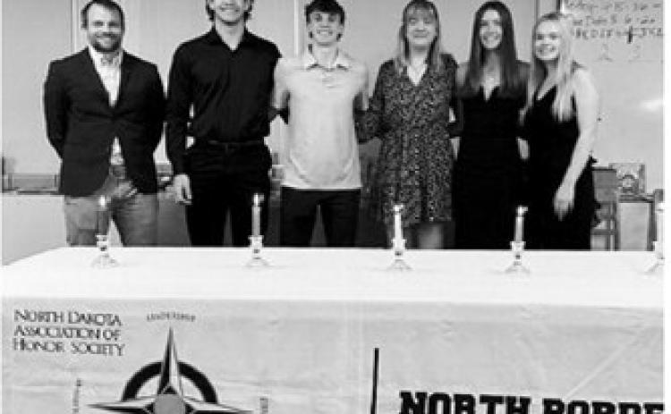 Pictured, from left, are Mr. Huber (faculty adviser), Bryce Carignan, Kaden Moore, Gracyn Hornung, Jaelyn Johnson and Jaci Fraser during the North Border High School National Honor Society induction ceremony. Submitted photo