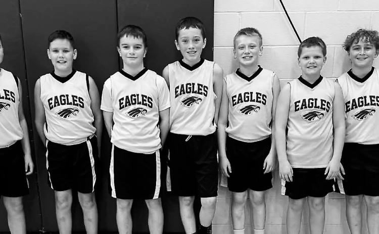 L-R: Blake Rollness, Jace Rollness, Jett Rollness, Griffin Moe, Cohen Trupe, Nixon Tryan and Hudson Ehlers. Coach Jason Tryan. Submitted photo