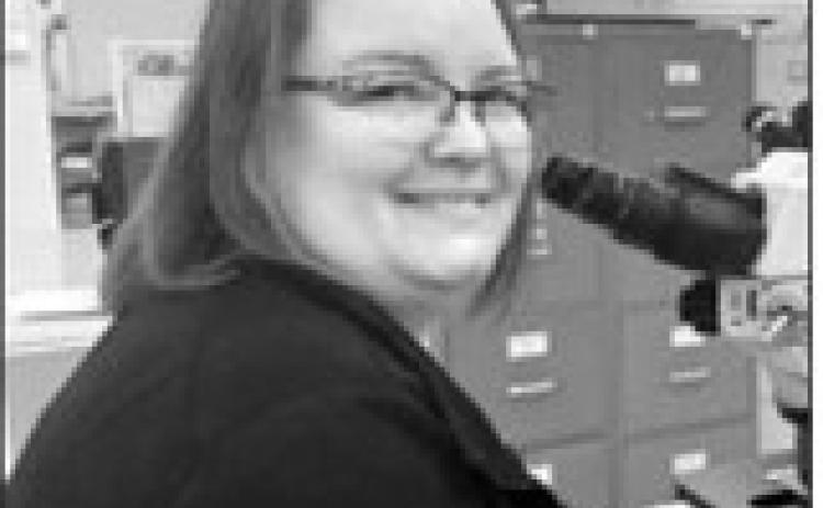 Bekki Holzkamm, lab manager at West River Health Services in rural North Dakota, has been trying to hire a technician since late summer. But not one U.S. citizen has applied. West River will have to pay a new $100,000 H-1B visa fee — or request an exemption — if it wants to hire one of its foreign applicants. (Kathrine Abelita).