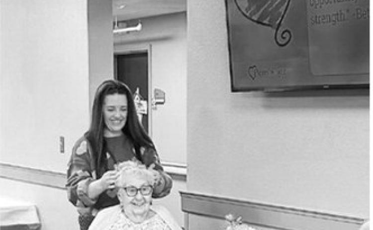 Kelsy crowns Queen Gerry. Submitted photo
