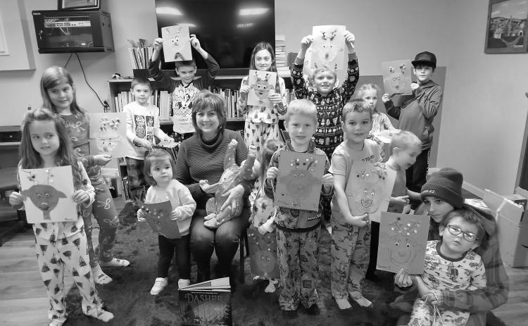 This week was a wonderful story about Dasher, the reindeer. Joan Chaput did a great job with the kids. They made reindeer out of construction paper, and they had cupcakes from Michelle for snack. Thank you, ladies, it was a great turnout. Photo by Deb Brusseau.