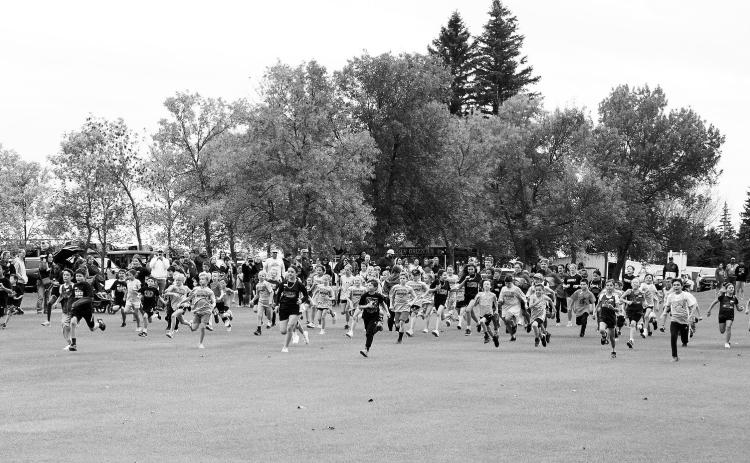 A large group of elementary students took to the course at the Harvey Hope Classic meet in Langdon on Sept. 23 and ran before the JV and Varsity teams took to the course. Photo by Larry Stokke.