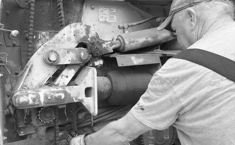 An infrared thermometer can alert farmers of dangerous temperature spikes at the bearings. (NDSU photo)