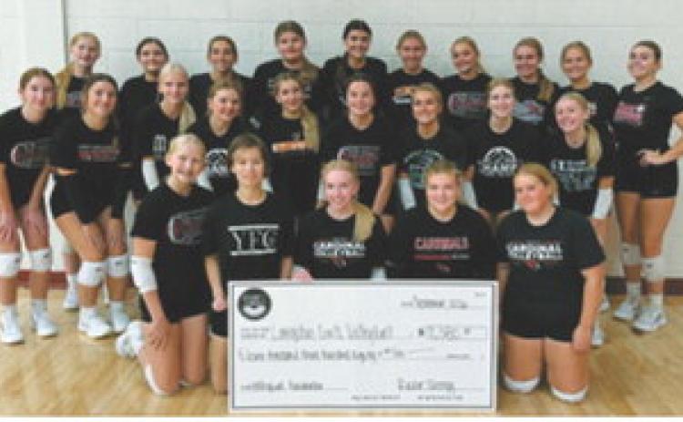 The Langdon-Munich girls volleyball team celebrates a successful Rockin’ Energy fundraiser that raised $11,380 for the program. The team sold $22,760 in products, totaling 487 individual kits, with Rockin’ Energy giving 50% of the amount raised back to the team.