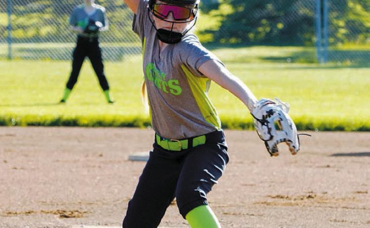 Sadie Pankratz winds up and send a strike across the plate against Grand Forks on June 8. Photo by Larry Stokke.