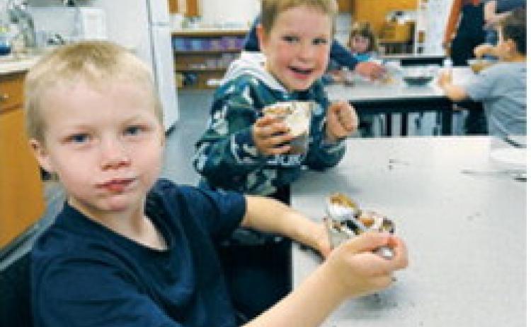 One group of parenting students taught preschoolers how to make dirt cups as part of a final project exploring fun summer activities that don't involve screens. The day also included scavenger hunts and fort building. Submitted photo