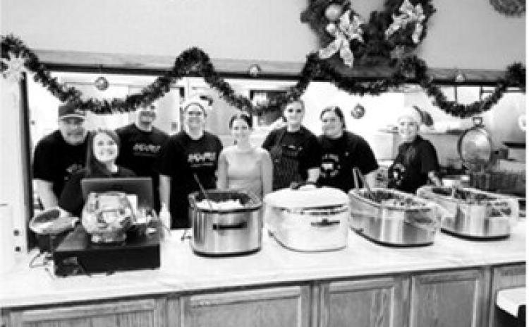 Pictured are members of the Langdon Area Chamber of Commerce board, who put on the Mingle Jingle Brunch: Dave Bakke, Brandi Mittleider (executive director), Ryan Beattie, Annamarie Lill, Morgan Zeis, Sarah Mikkelson, Kayce Schlittenhard, and Courtney Krom. Submitted photo.