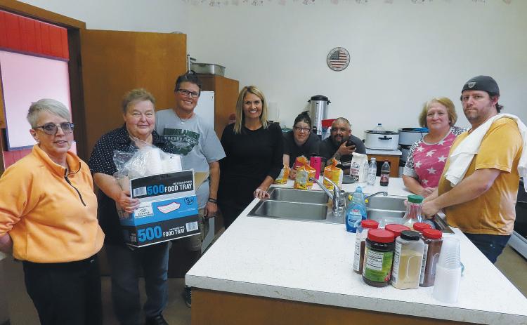 Pictured are Cheryl Trupe, Sarah Brooks, Teirney Dunnigan, LaRae Horgan, Jesse Lipsch, Nano Moreno, Kathy Kopf, and Lance Waters. Photo by Melanie Thornberg.