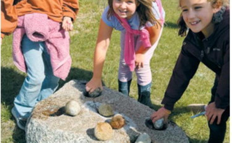 Third-graders enjoyed time outdoors while visiting the museum and orchard. Photo submitted by Gretta Ohmann