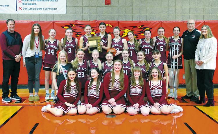 The Lady Cardinals Region 2B Championship team. Photo by Larry Stokke.